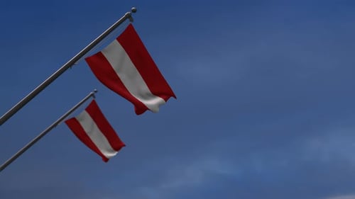 Waving Austrian Flag on a Clear Blue Sky