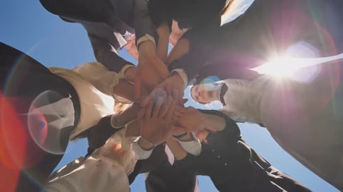 College Students Alumni Teamwork Stacking Hand Concept