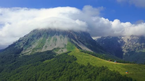 Aerial View Over Mountains Under Cloudy Sky in Summer Day in Komovi Mountains Montenegro