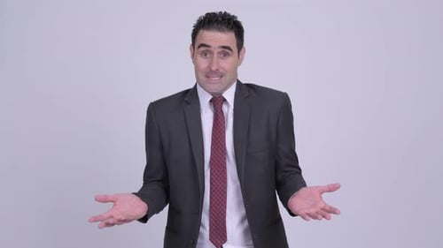 Adult Man In Suit Gesturing Open Handed