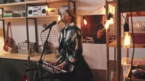 Cool Rock Girl Playing Piano And Singing