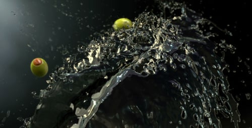 Dynamic Water Splash with Olives in Slow Motion
