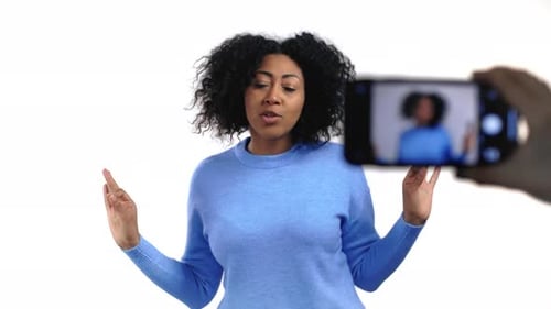 Woman Explaining with Mobile Phone Recording