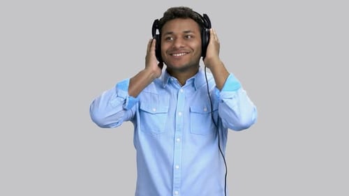 Man Listens to Music, Enjoys the Sound