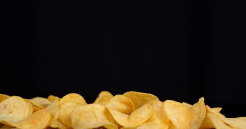 Crispy Potato Chips Slowly Rotate.