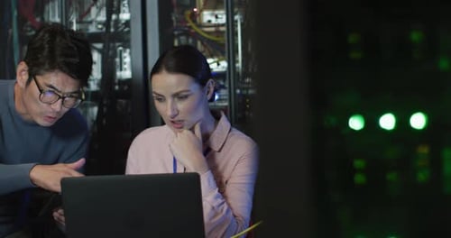 Technicians Working in Data Center Server Room