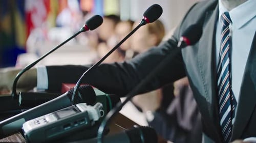 Close Up of Corporate Conference Podium Microphones