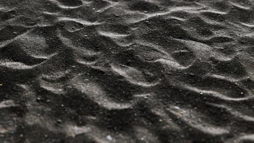Abstract Dark Sand Texture with Shifting Light Animation