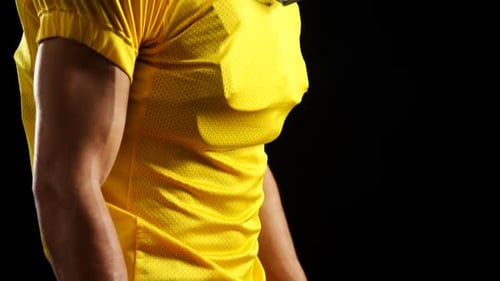 Intense Football Player Portrait in Full Uniform