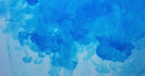 Abstract Blue Ink Dissolving in Water