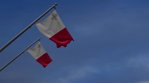 Waving Malta Flag Against Blue Sky Background