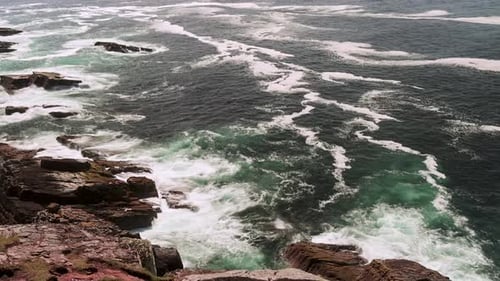 Waves Crashing Onto Rocks