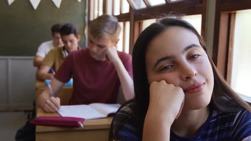 Portrait of teenage girl in a school classroom