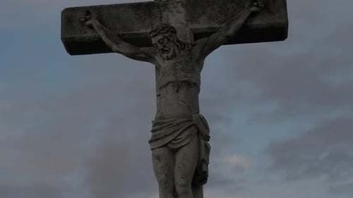 Stone Statue Of Christ On A Cross