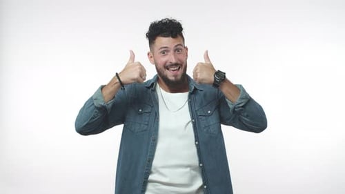 Smiling Man Gives Two Thumbs Up