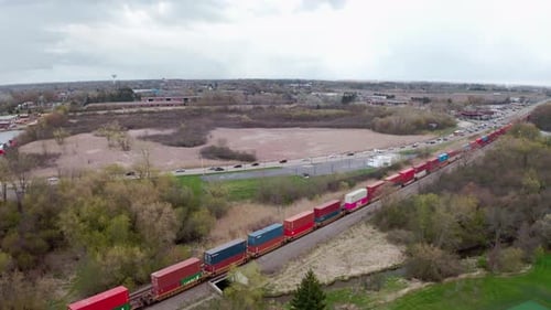 Aerial View of Freight Train Moving Containers