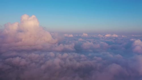 Dreamy Pink and White Clouds at Sunrise