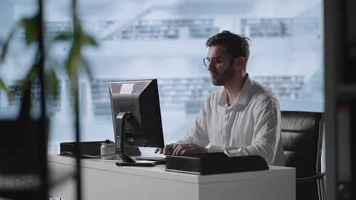 Businessman Working on Computer at Home Office