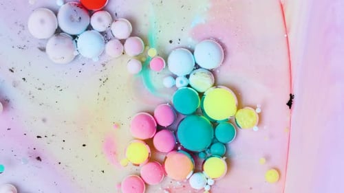 Vibrant Colorful Bubbles Floating in Liquid