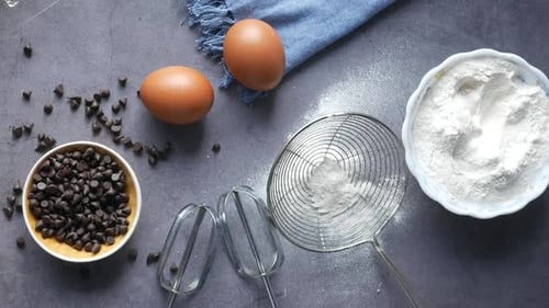 Baking Ingredients on a Black Background Top View