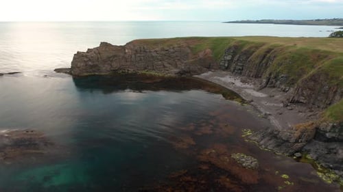 Drone flight around a picturesque rocky coastline