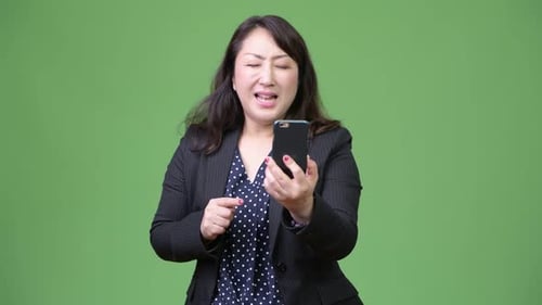 Woman Reacts Negatively to Something on Phone