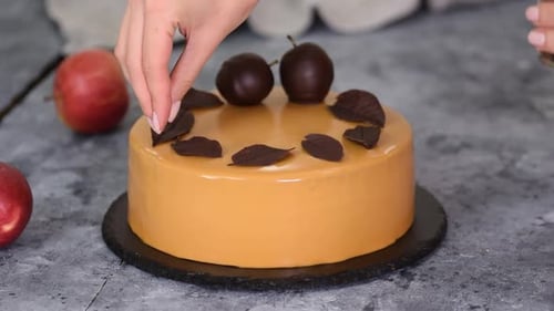 Pastry Chef Decorating Mousse Cake Small Chocolate Pieces