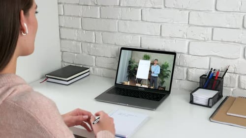 Woman at Home Office Study Online Video Call Webcam Chat Laptop Tells Teacher