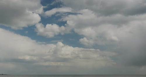 Clouds Moving Over Calm Ocean Waters