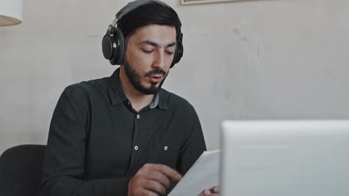Man Works From Home in Video Call
