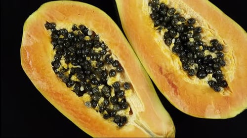 Exotic Plant Papaya On Black Background.