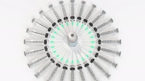 Medical Vaccine Vial and Syringes Rotating Reveal Animation
