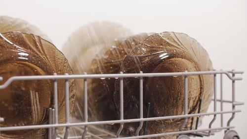 Water Washing Dishes in a Dishwasher