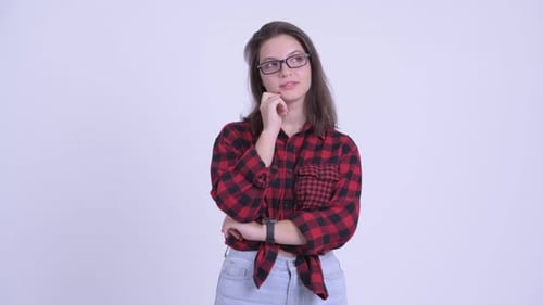 Woman Thinking and Looking Upward in Studio