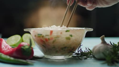 Steaming Noodles with Chopsticks in Appetizing Close-up