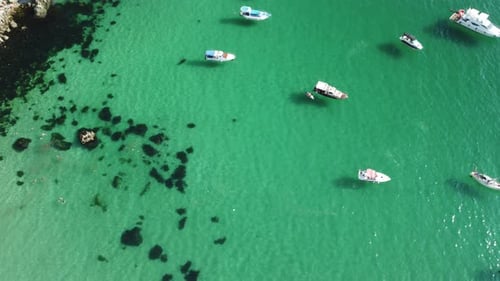 Aerial Panoramic View of Seascape with Crystal Clear Azure Sea and Rocky Shores