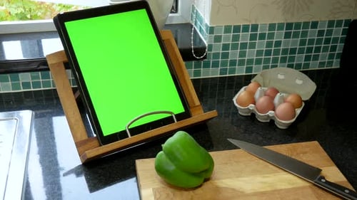 Cooking/ baking preparation with a green screen tablet recipe