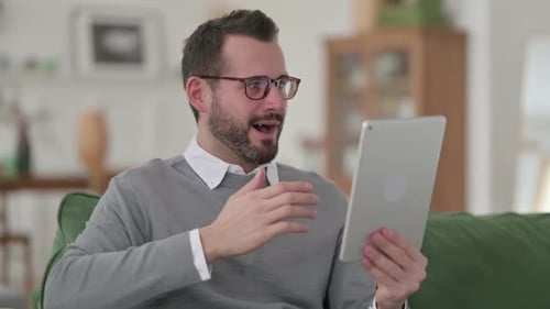 Excited Man Using Tablet, Celebrating Success
