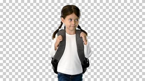 Smiling little girl walking to school, Alpha Channel