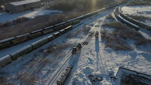 Aerial View of Train and Train Cars in Winter