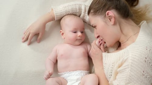 Loving Mother bonding with Infant at Home