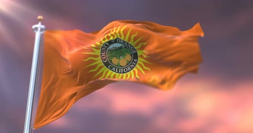 Flagge von Orange County bei Sonnenuntergang