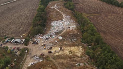 Waste Processing on a Rubbish Dump. Aerial View of Large Garbage Pile at Sorting Site. Packed Waste