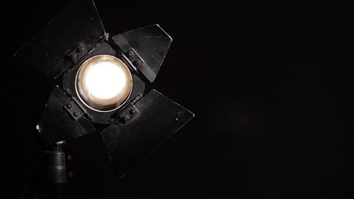 Studio Lighting Switching On and Off on Black Backdrop