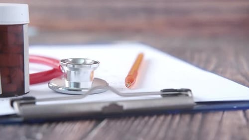 Healthcare Tools Displayed on Wooden Table