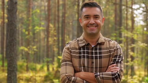 Happy Smiling Middle Aged Man in Forest