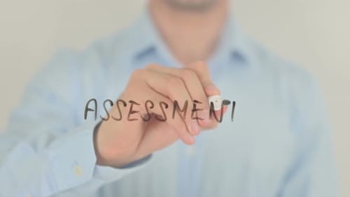 Assessment, Man Writing on Transparent Screen