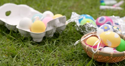 Decorated Easter Eggs on Green Grass Close Up