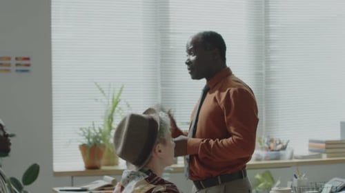 African American Professor Explaining Math to University Students