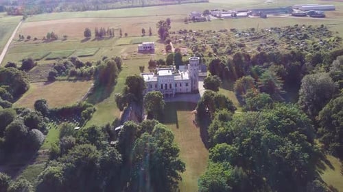 Vecauce Manor in Latvia Aerial View of the Pink Castle Through the Park.